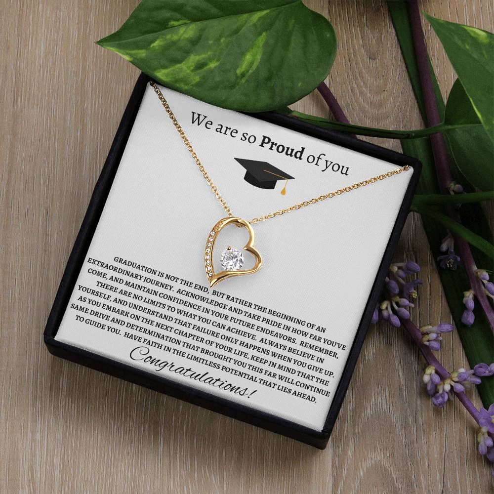 Gold heart-shaped necklace with a message card, featuring a sparkling cubic zirconia crystal and an elegant design, perfect for a meaningful gift
