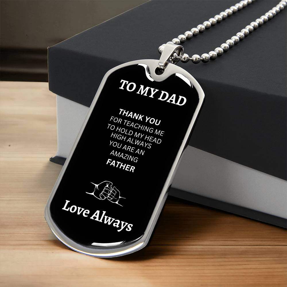 Front view of silver dog tag with 'To My Dad' engraving, made from high-quality surgical steel, showcasing a sleek and polished design."