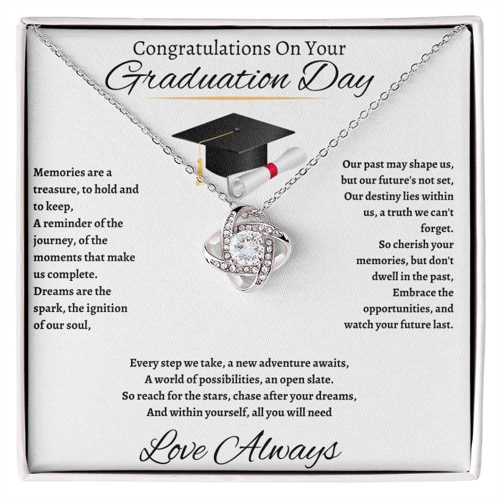 Front view of Love Knot Necklace with a message card, featuring a sparkling cubic zirconia crystal and elegant design, perfect for a meaningful gift0